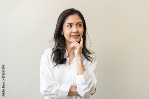asian woman in casual dress thinking and imagination isolated on background