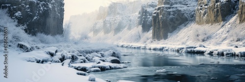 River through snowy rocks on cold winter morning