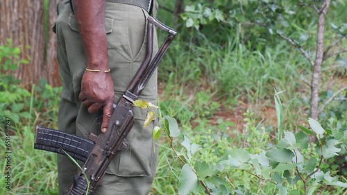 Close-up of a ranger with a rifle in Mozambique, Africa photo