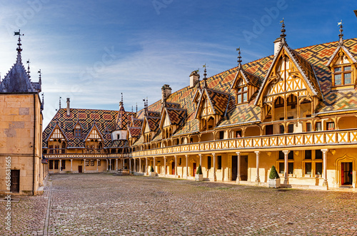 The Hospices de Beaune or Hôtel-Dieu de Beaune is a former charitable almshouse in Beaune, France