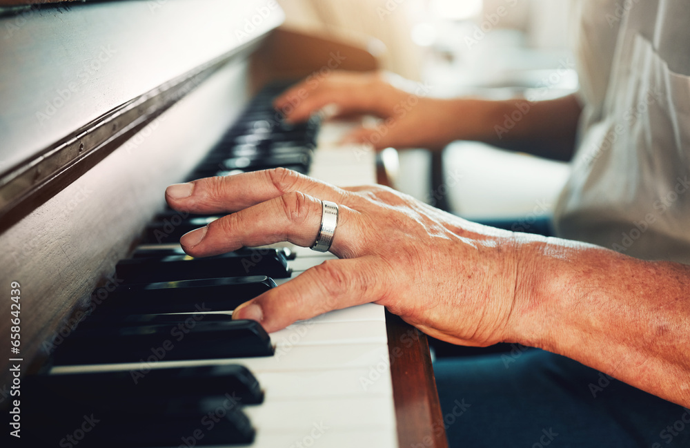 Hands, piano and senior man playing for music in living room for musical entertainment practice. Instrument, hobby and elderly male person in retirement enjoying a song on keyboard at modern home. - obrazy, fototapety, plakaty 