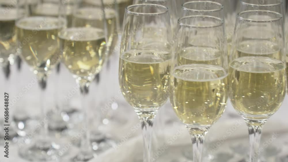 A row of glasses with champagne A row of glasses with champagne