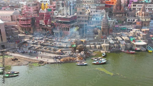 Fire Burial in Varanasi, India on Manikarnika ghat on Ganges River Drone 4K photo