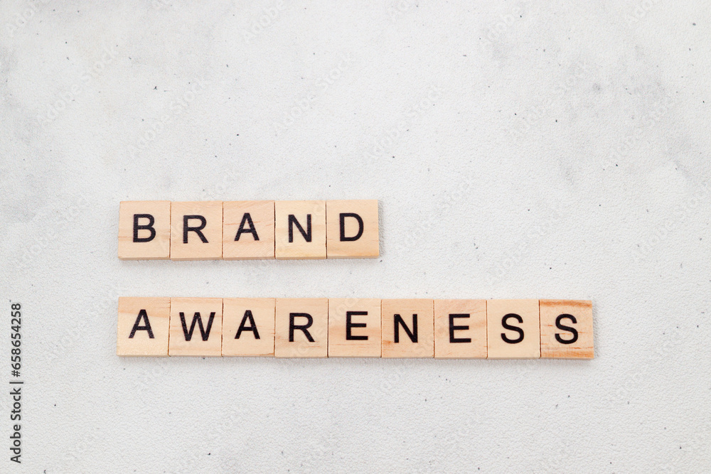 Top view of Brand Awareness word on wooden cube letter block on white background. Business concept Top view of Brand Awareness word on wooden cube letter block on white background. Business concept