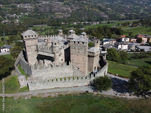 Vista  aerea dal drone. Il castello di Fénis è un castello medievale italiano situato nel comune di Fénis. È uno dei castelli più famosi della Valle d'Aosta. photo