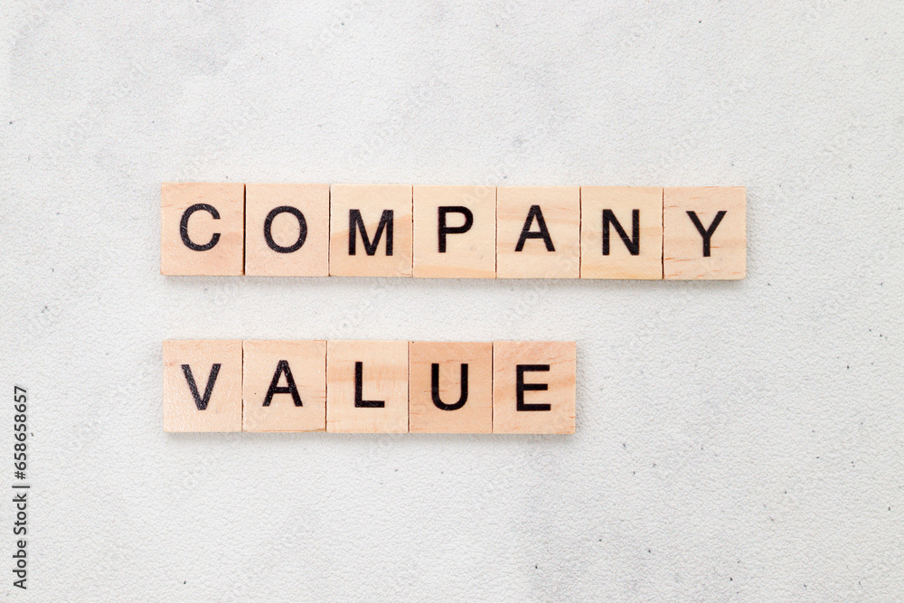 Top view of Company Value word on wooden cube letter block on white background. Business concept Top view of Company Value word on wooden cube letter block on white background. Business concept