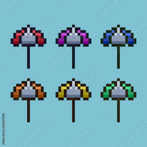 Pixel art sets of beach umbrella with variation color item asset. Simple bits of umbrella on pixelated style. 8bits perfect for game asset or design asset element for your game design asset