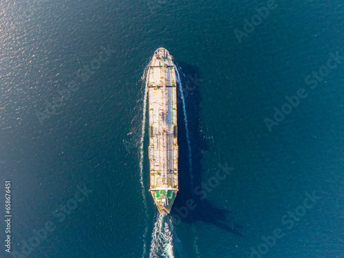 Aerial view of freight ship with cargo containers. © FATIR29