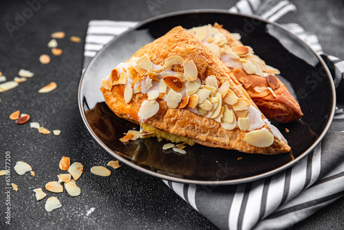 almond triangle cake cream puff pastry sweet dessert delicious healthy eating cooking appetizer meal food snack on the table copy space photo