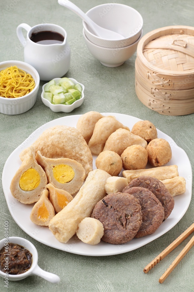 Pempek, mpek-mpek and also known as colloquially as empek-empek is a savoury Indonesian fishcake delicacy, made of fish and tapioca, from Palembang, South Sumatera, Indonesia. Pempek, mpek-mpek and also known as colloquially as empek-empek is a savoury Indonesian fishcake delicacy, made of fish and tapioca, from Palembang, South Sumatera, Indonesia.