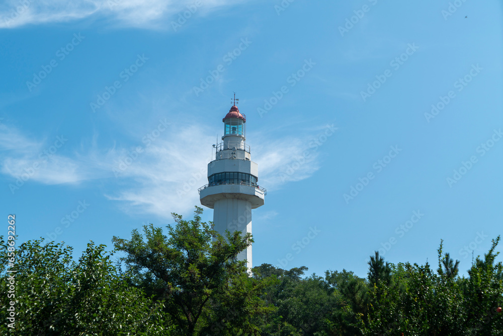 The White Lighthouse of Yantai Mountain Park, Yantai, Shandong, China The White Lighthouse of Yantai Mountain Park, Yantai, Shandong, China