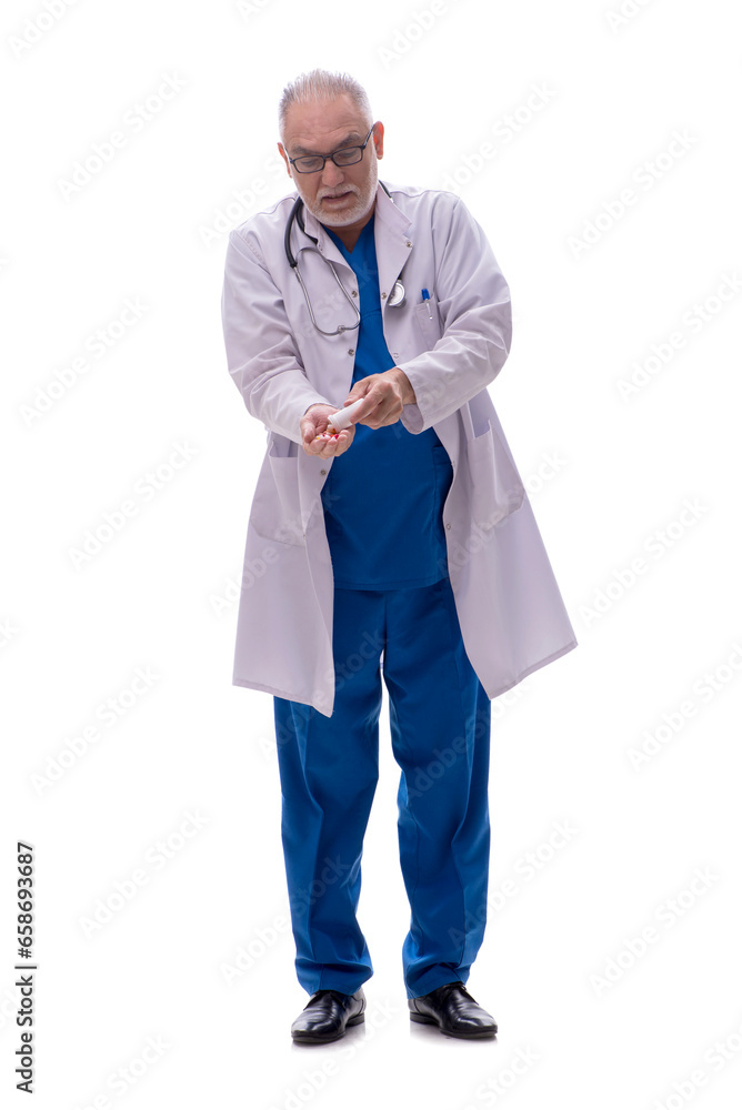 Old male doctor isolated on white Old male doctor isolated on white