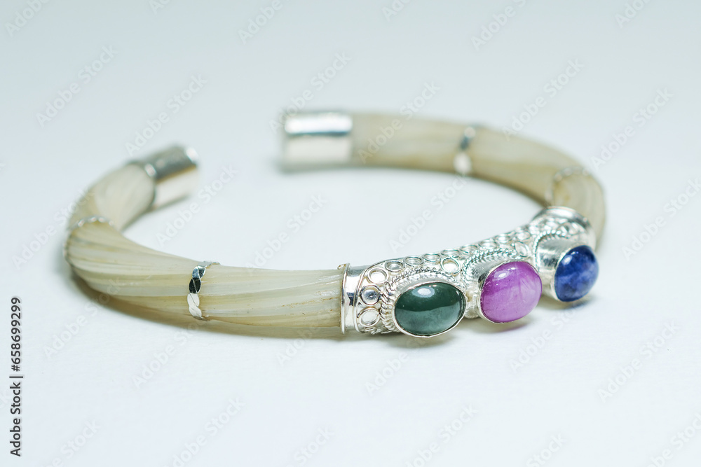 Gemstone jewelry display on white background Gemstone jewelry display on white background