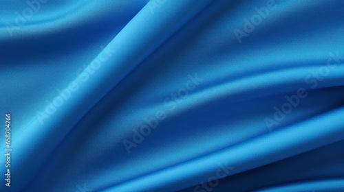 Close up top view of textured fabric of a blue sports jersey