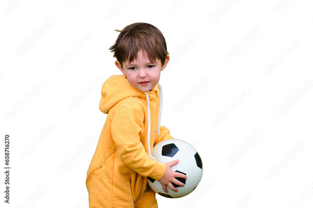 A young child is actively playing soccer in the park, isolated on white background. Kid aged two years (two-year-old boy) A young child is actively playing soccer in the park, isolated on white background. Kid aged two years (two-year-old boy)