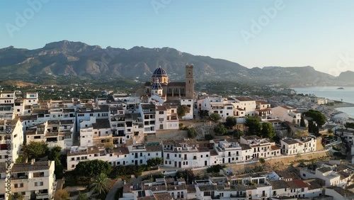Aerial view Church of Our Lady of Consolation, Altea in Spain. Forward Flight.  Catholic Church in Costa Blanca,Spain.