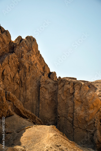 View of the mountain of natural sandstone against the blue clear sky. Desert landscape, Egypt, Africa. Copy space. Selective focus.