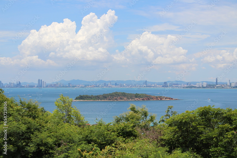 Aerial view of a small island In the middle of the Gulf of Thailand. Aerial view of an island in the ocean. View of a small island in the middle of the sea. Thailand.