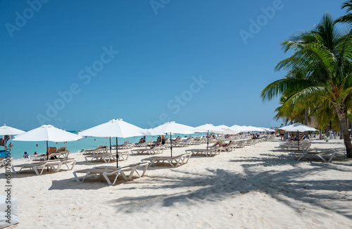 Paradise beach with white sand, beach bars and a great view on Cancun on isla mujeres, quintana roo, mexico