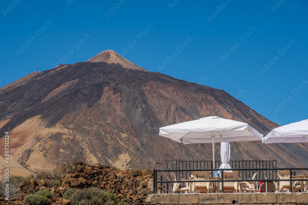 Fototapeta Mount Teide, Tenerife, with cafe tables in the foreground