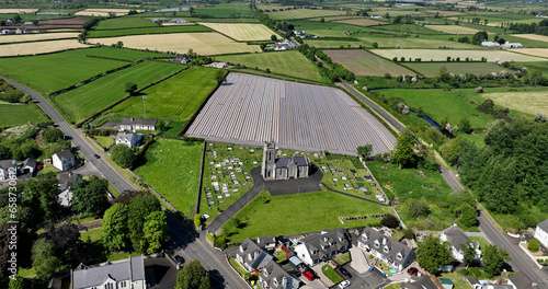 Aerial photo of Church of Ireland Dervock Anglican Church on the North Coast Co Antrim Northern Ireland photo