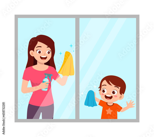 little kid help mother cleaning window