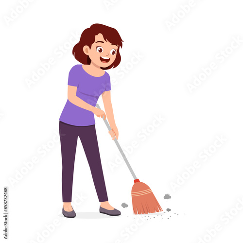 young woman sweep the floor using broom