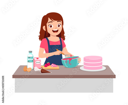 young woman baking pink strawberry cake