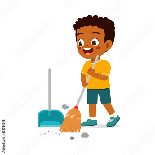 little kid sweep floor with broom
