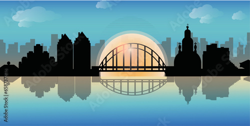 city skyline reflected in water