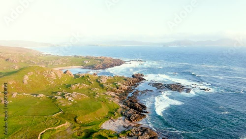 Ineuran Bay coast and cliffs, Malin Head, Ireland's northernmost point, famous Wild Atlantic Way, spectacular coastal route. Wonders of nature. Numerous Discovery Points. Co. Donegal photo