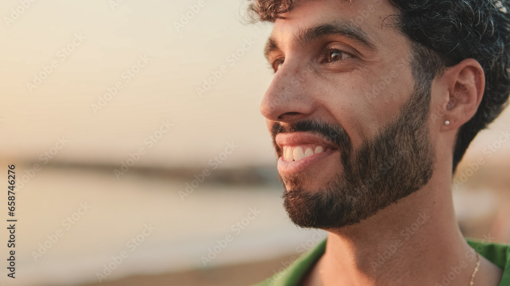 Fototapeta premium Close-up portrait of young guy talking to someone