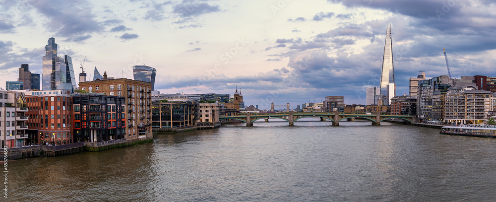 Panoramic view of the skyline of London from Millenium Bridge