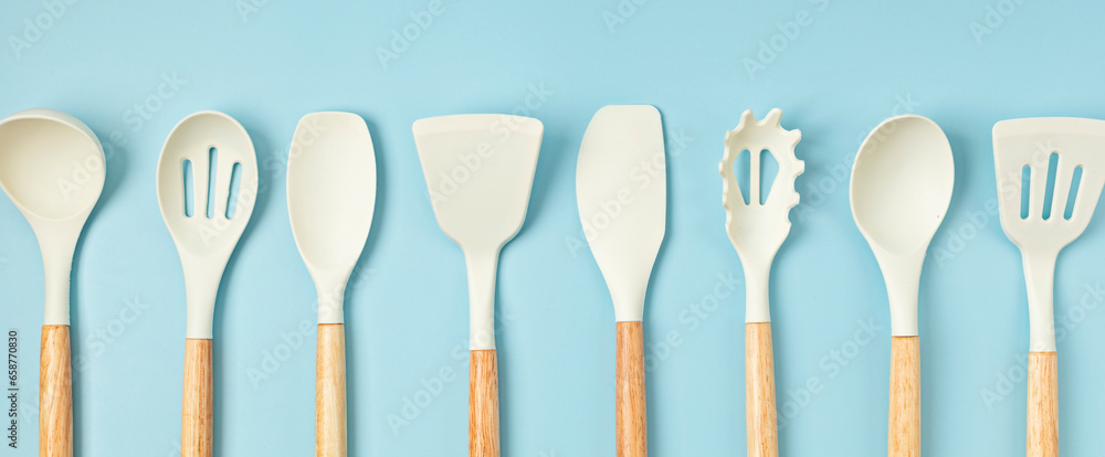 Fototapeta premium Pastel color kitchen utensils top view. Cooking blog, classes, workshop, recipe template concept