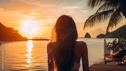 Woman enjoying a serene sunset by the poolside with tropical vibes, travel and relaxation theme © Artyom