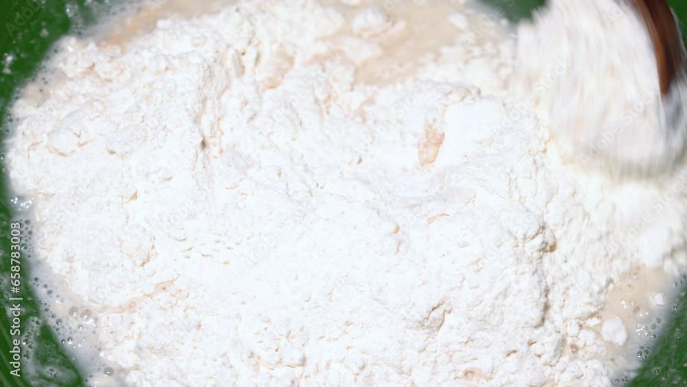 Baker kneading dough in flour on table. Baker kneading dough in flour on table.