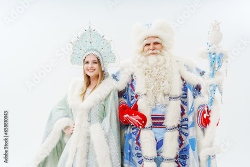 a traditional Father Frost and Snow Maiden costume on a white background.