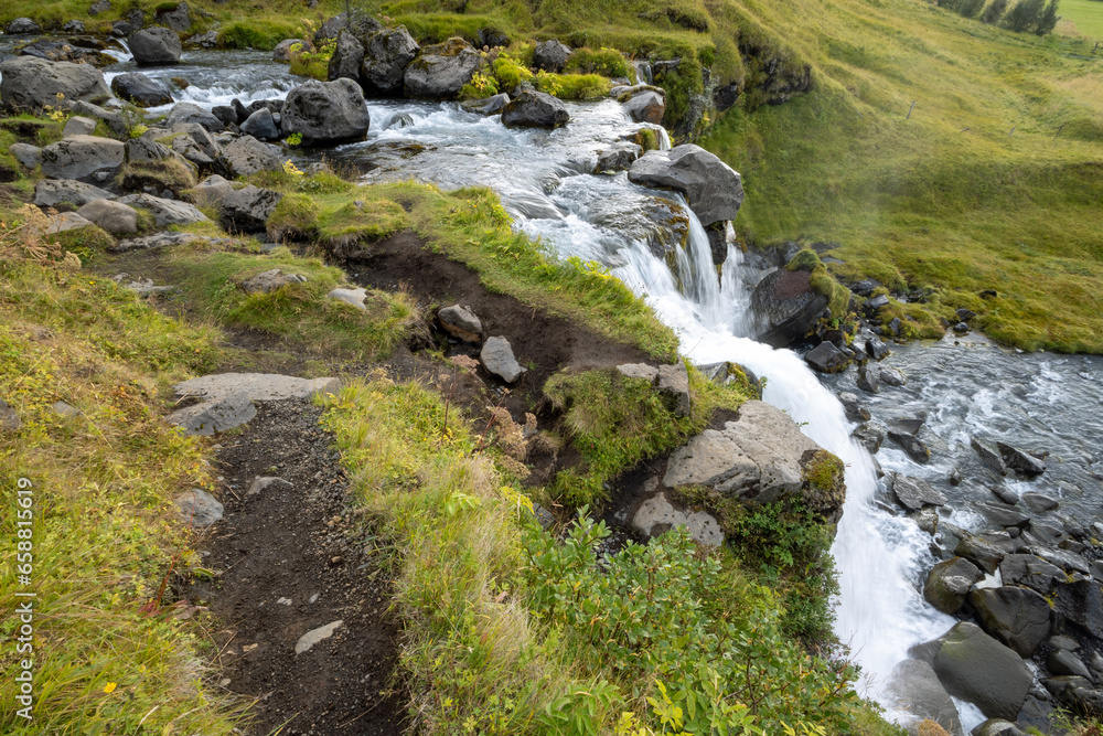 Gluggafoss - Window Falls - also known as Merkjarfoss near Hvolsvollur, Iceland on sunny overcast autumn morning. Gluggafoss - Window Falls - also known as Merkjarfoss near Hvolsvollur, Iceland on sunny overcast autumn morning.