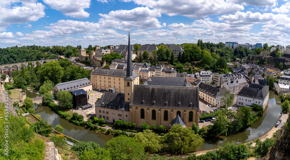 Panorama of Neumünster Abbey, surrounded by Alzette river, in the Grund district of Luxembourg City