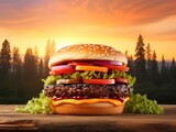 a cheeseburger with a sunset in the background
