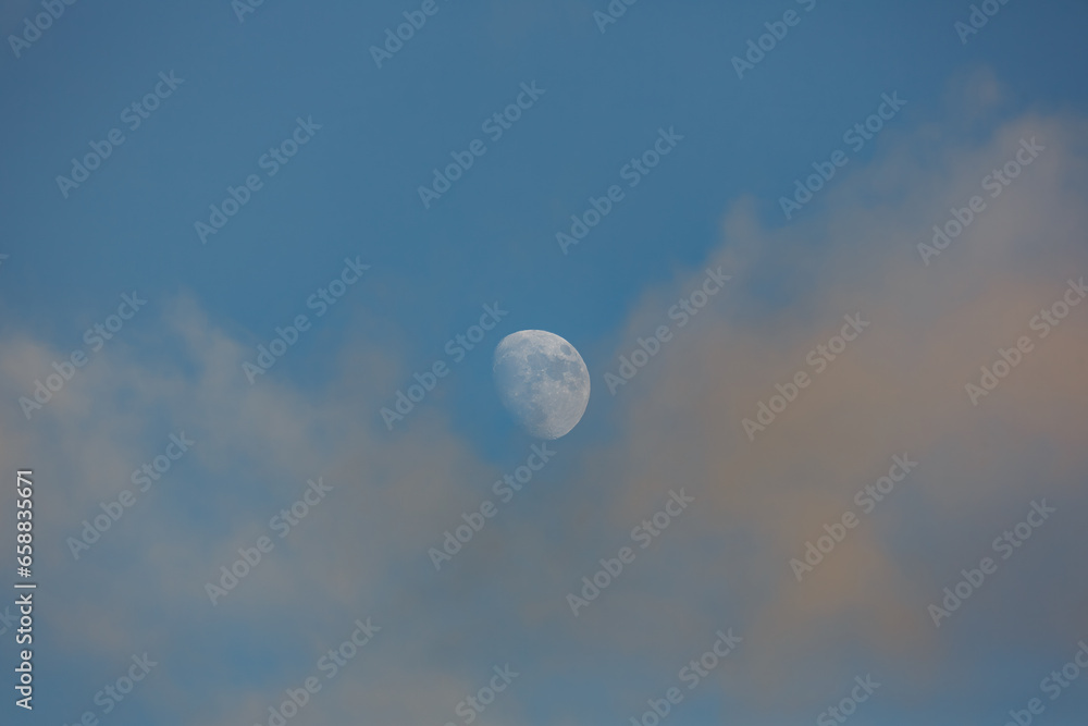 Daytime Delight: Crescent Moon Amidst Clouds Daytime Delight: Crescent Moon Amidst Clouds