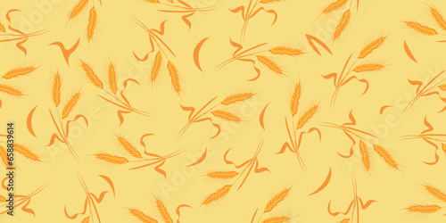 Many wheat spiketels on yellow background. Pattern for design