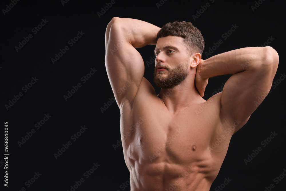 Handsome muscular man on black background, space for text. Sexy body Handsome muscular man on black background, space for text. Sexy body