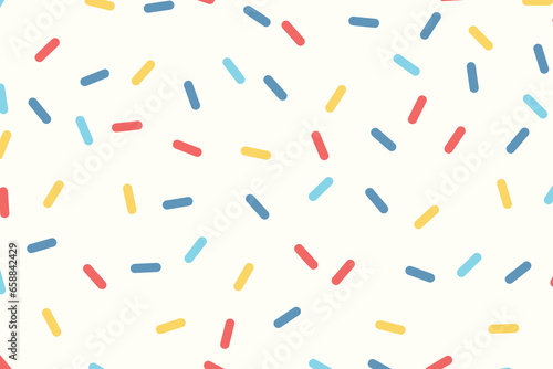 Colorful sprinkles on white background