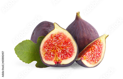 Cut and whole ripe figs isolated on white