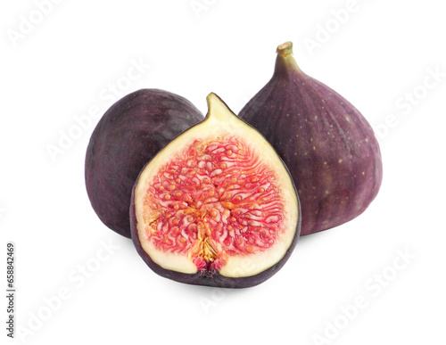 Cut and whole ripe figs isolated on white