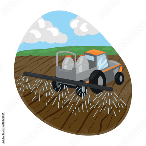 Tractor irrigating plowed filed on spring day