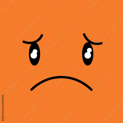 Drawn orange sad face, closeup