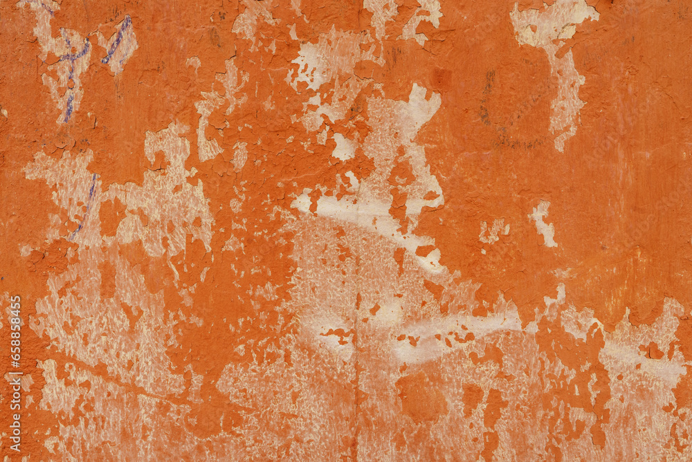 A cement wall painted red with the paint worn away. Vector cement texture background