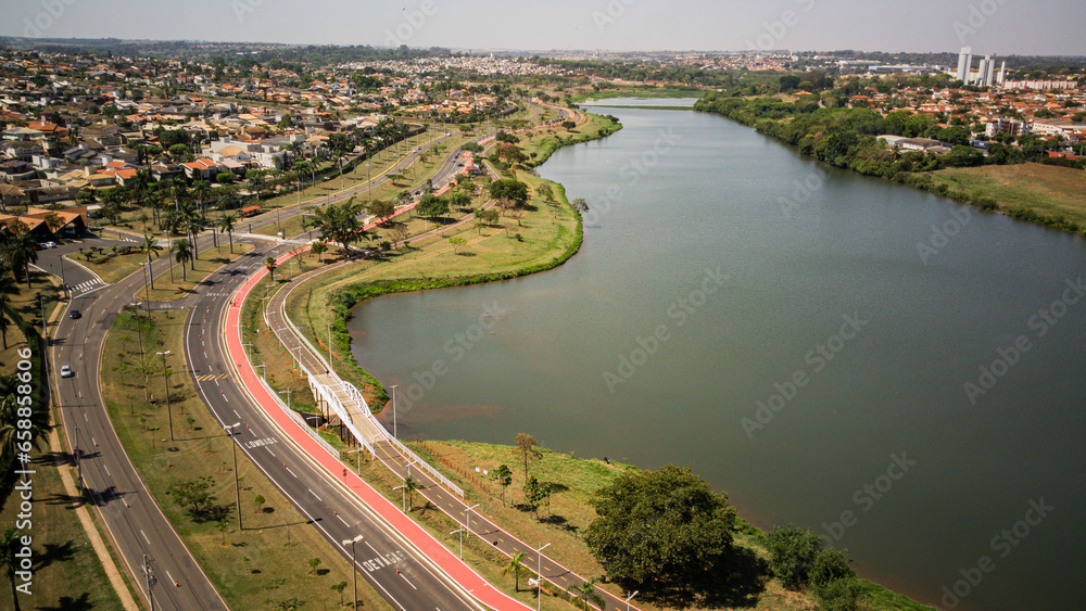 Fototapeta premium Aerial View of Reservoir and Damhas Region - São José do Rio Preto, Sunny Day